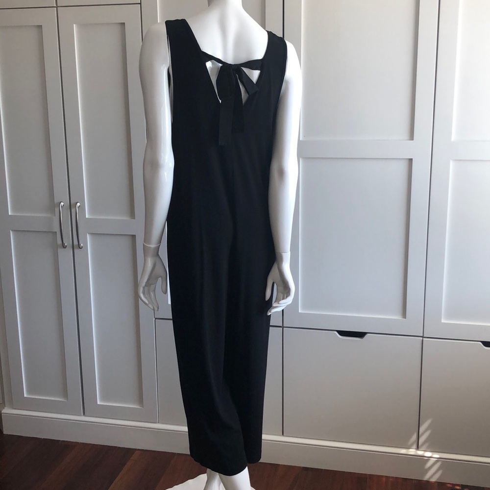 Sleeveless black v-neck tank jumpsuit tie back